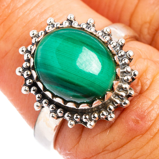 Malachite cabochon oval sterling silver ring with bead-like border, green stone