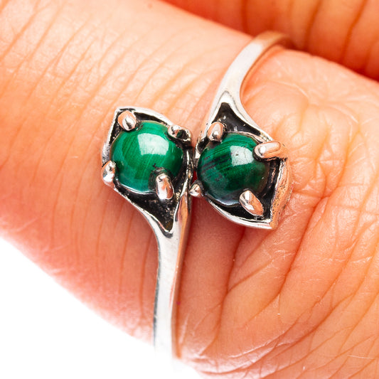 Sterling silver malachite ring with two prong-set dark green round stones, size 7
