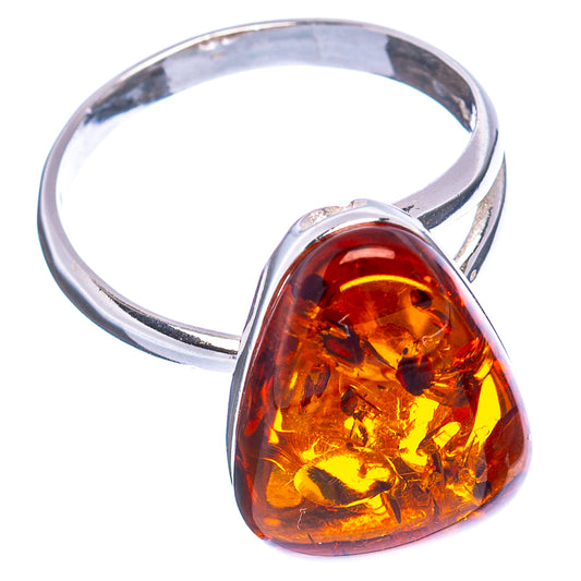 Amber teardrop ring set in polished .925 sterling silver band