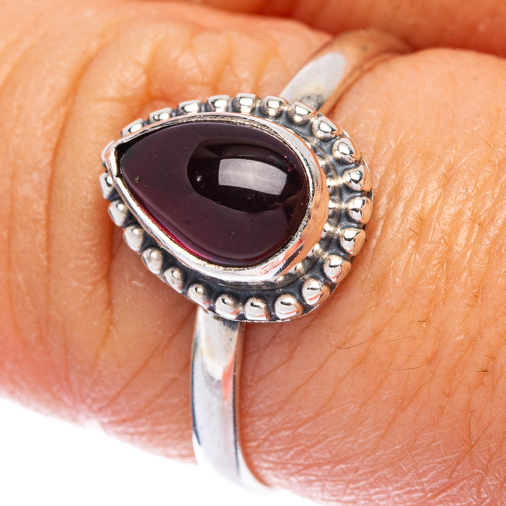 Garnet teardrop ring with beaded 925 sterling silver band, size 7.75.