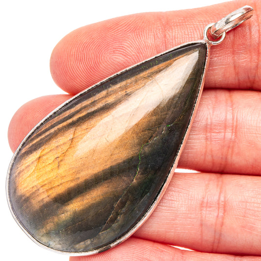 Silver-plated labradorite pendant, teardrop stone with metallic sheen and loop bail