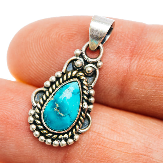 Sterling silver turquoise teardrop pendant with ornate beaded border