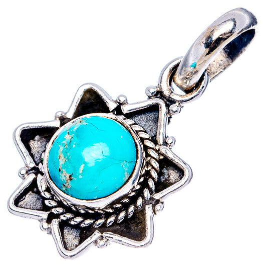 Turquoise oval stone pendant in engraved silver star setting with clasp bail