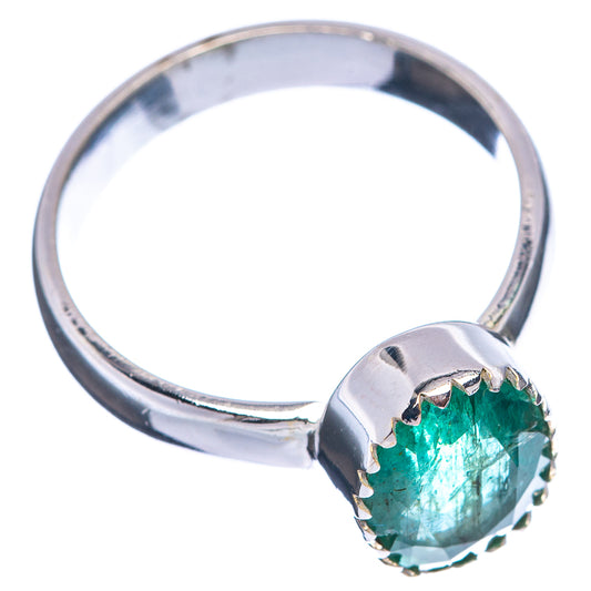 Silver ring with round green emerald in prong setting, side view, size 6
