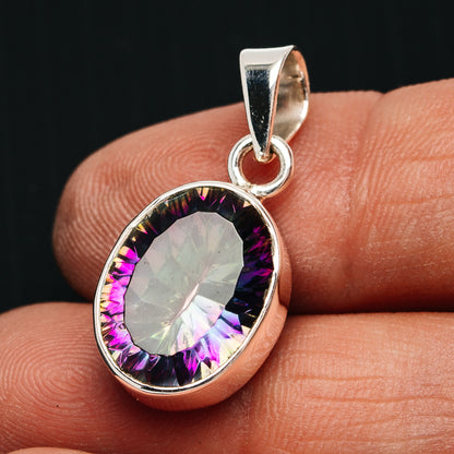 Oval rainbow mystic topaz pendant with .925 sterling silver bezel and bail