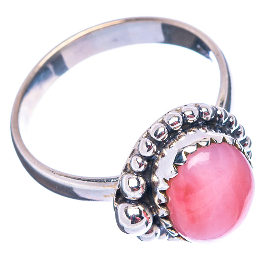 Sterling silver ring with pink round opal and textured bead band