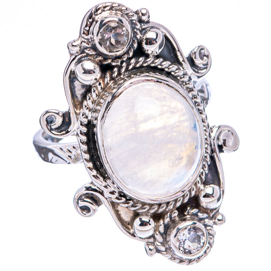 Sterling silver moonstone ring with ornate bezel and round crystal accents