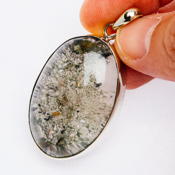 Oval garden quartz pendant in German silver bezel, multicolor glitter stone center