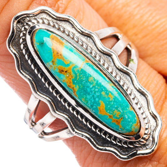 Turquoise oval statement ring with rope border, ornate .925 sterling silver setting