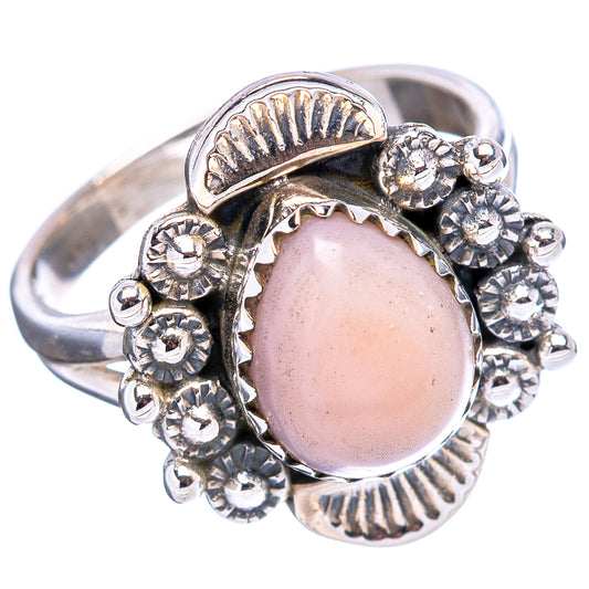 Sterling silver native-style ring featuring a pink oval opal in raised bezel