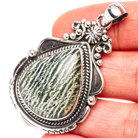 Green Swiss opal teardrop pendant in .925 sterling silver with ornate border and bail