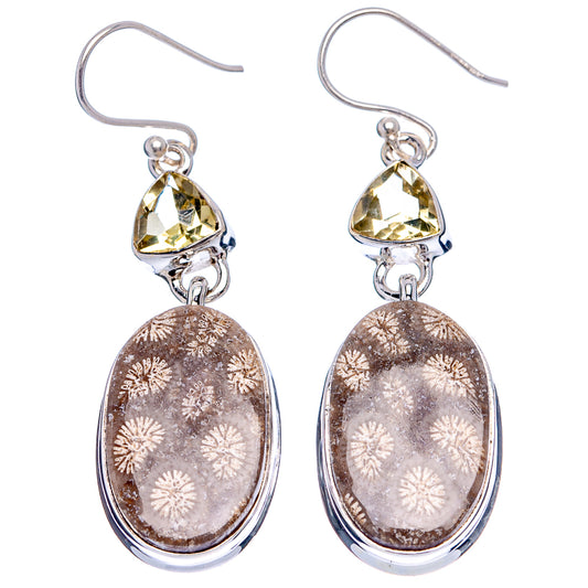 Sterling silver oval dangle earrings with yellow faceted accents and fossil coral face