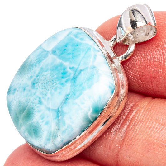 Sterling silver Larimar pendant with oval blue-and-white gemstone, hinged bail