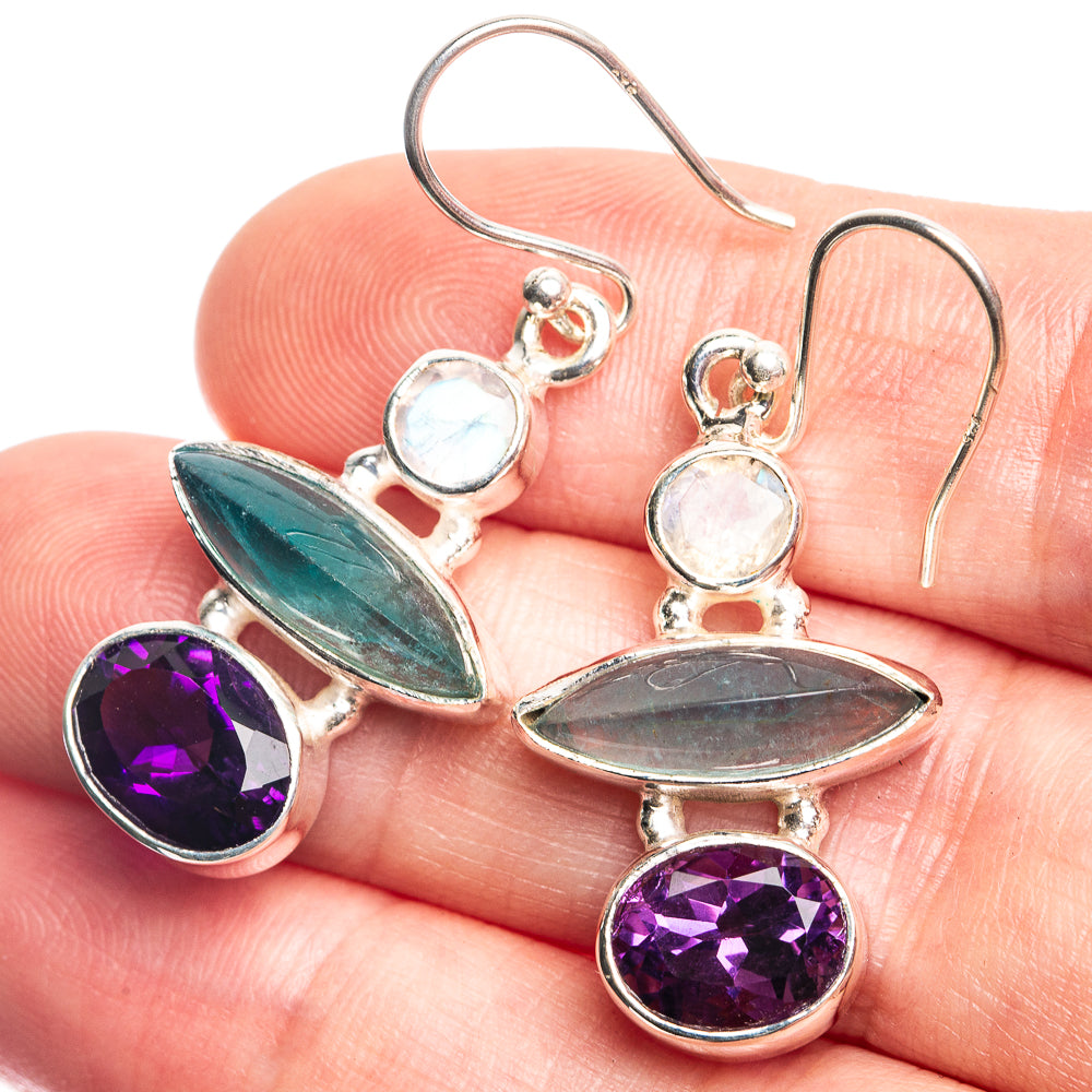 Sterling silver drop earrings with purple, teal and opalescent stones, hinged hooks