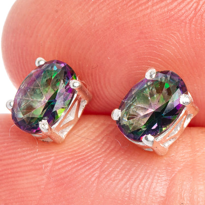 Faceted oval multicolor gemstone stud earrings in 925 sterling silver.