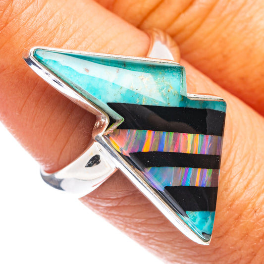 Sterling silver opal bolt ring with turquoise stone, black bar, and iridescent stripes