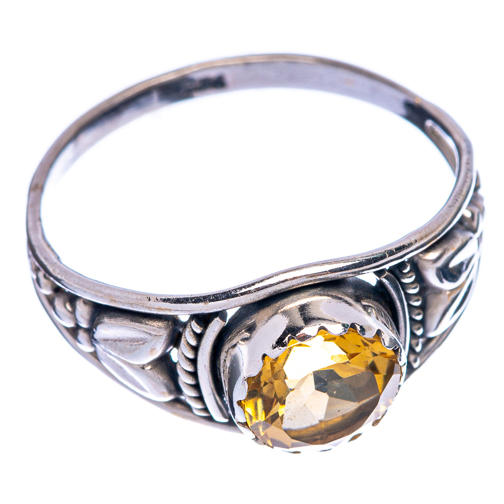 925 sterling silver ring with faceted yellow citrine centerpiece and detailed scrollwork
