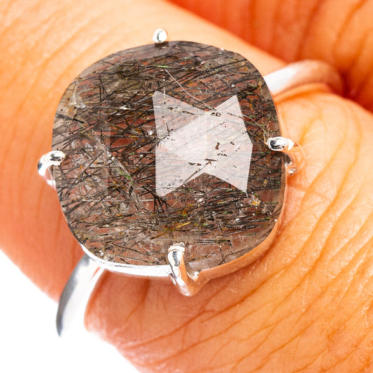 Sterling silver ring with large round tourmalinated quartz cabochon on hand