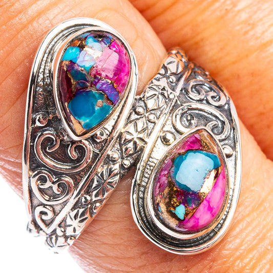 Sterling silver filigree ring with two oval pink and turquoise stone inlays