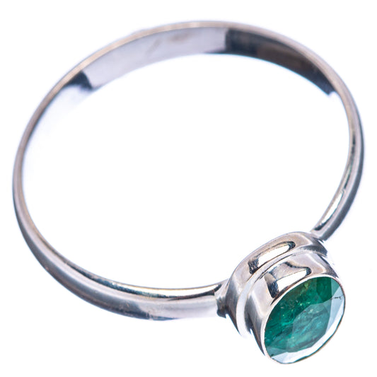 Sterling silver ring with green oval gemstone and open, rounded bezel setting