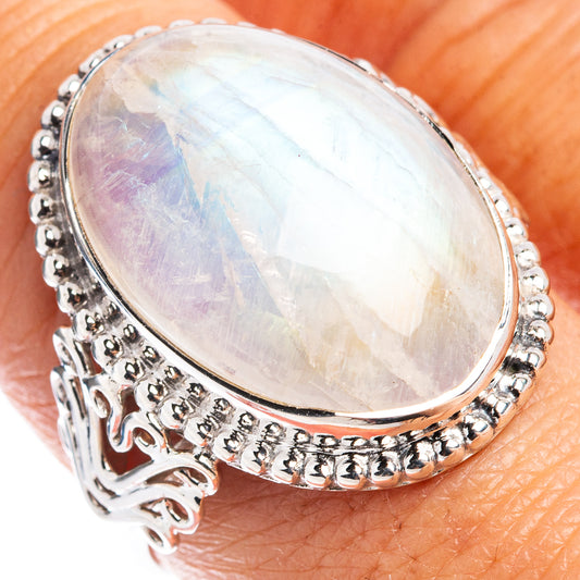 Sterling silver moonstone ring with oval rainbow opal cabochon, ornate bezel and band