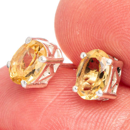 Faceted citrine dainty earrings in 925 sterling silver, prong-set oval stones