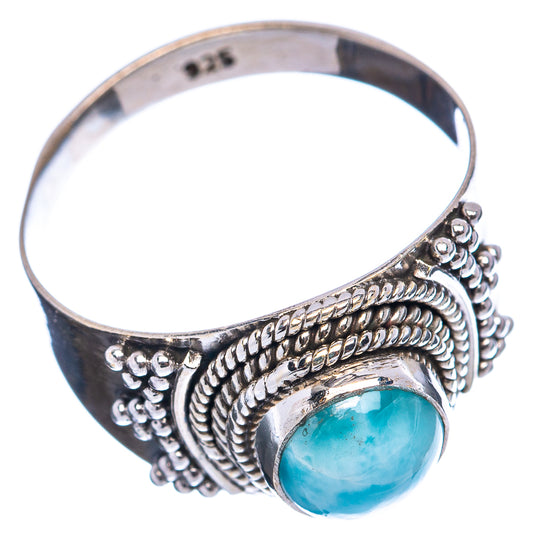 Larimar gemstone sterling silver ring band with detailed braided setting and oval blue stone