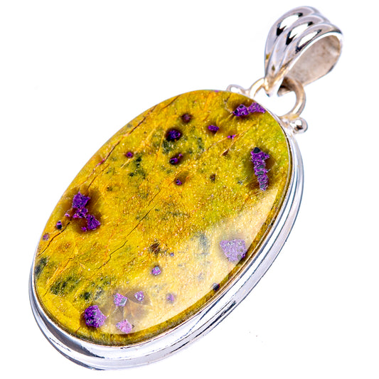 Oval stichtite pendant on bail, .925 sterling silver; yellow stone with purple specks