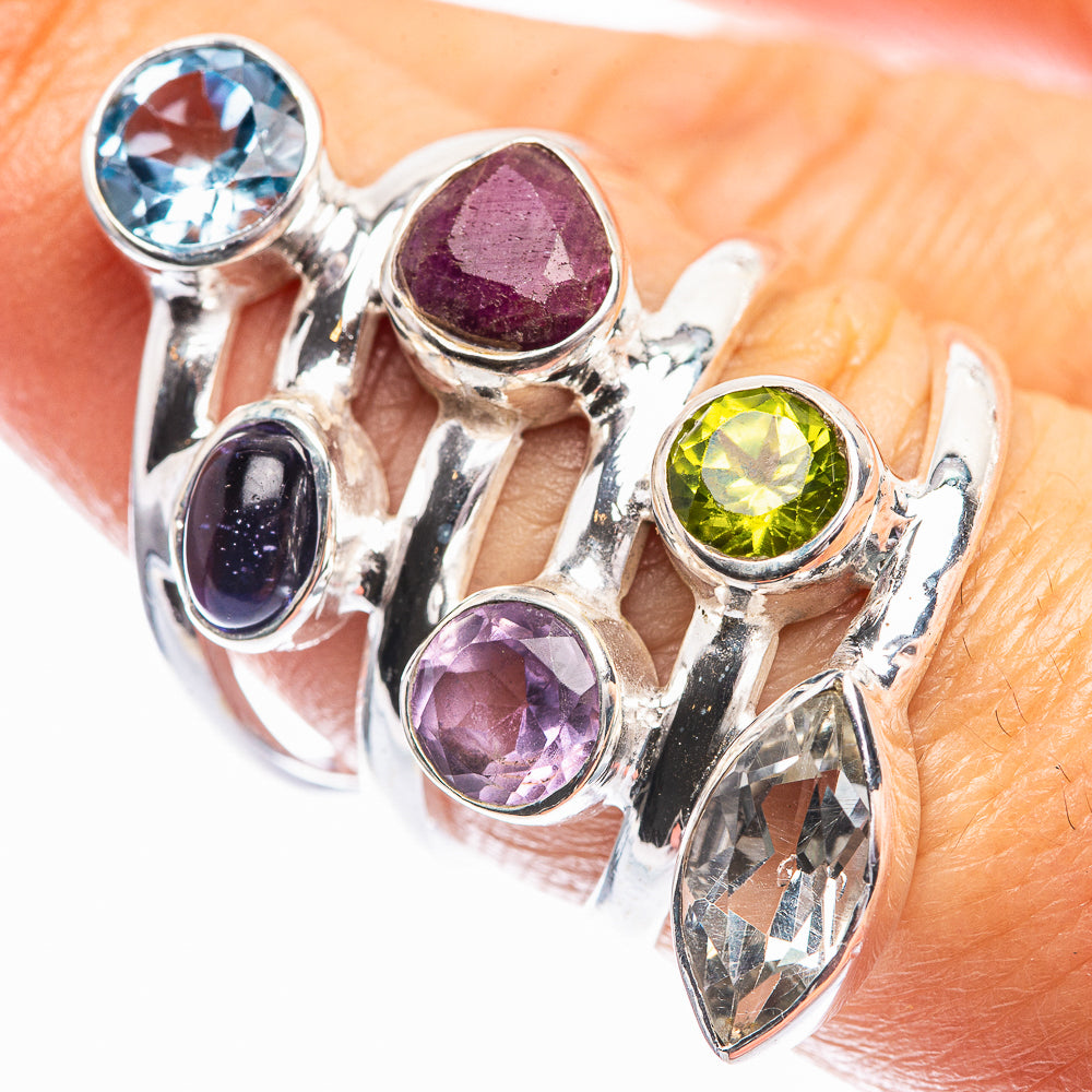 Sterling silver gemstone ring with blue, purple, green, dark and clear stones
