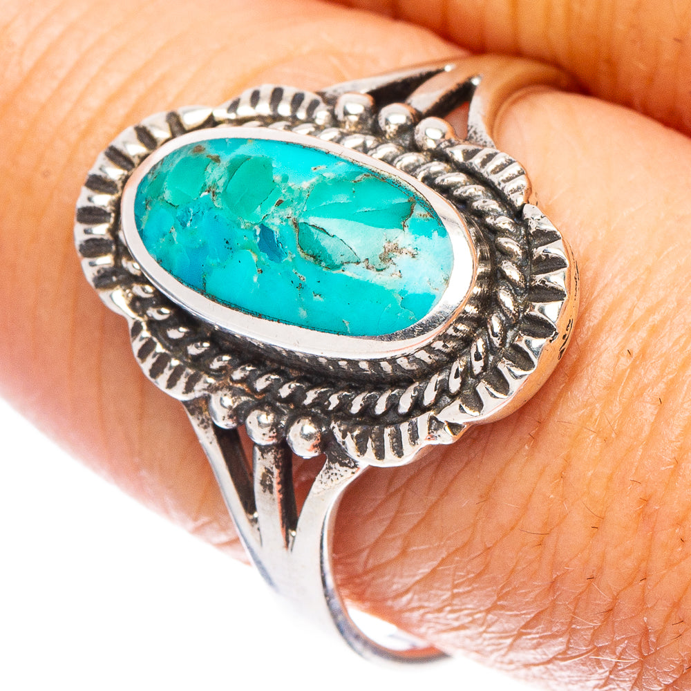 Turquoise oval cabochon sterling silver ring with ornate scalloped bezel