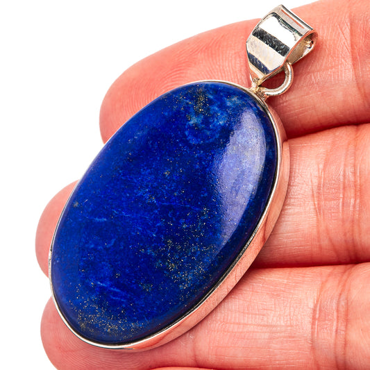 Lapis lazuli oval pendant with .925 sterling silver bezel and bail, blue stone