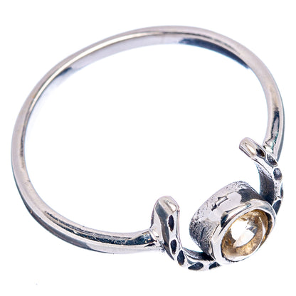 Dainty horseshoe sterling silver ring with bezel-set round citrine-look stone, side view