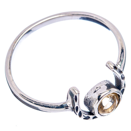 Dainty horseshoe sterling silver ring with bezel-set round citrine-look stone, side view