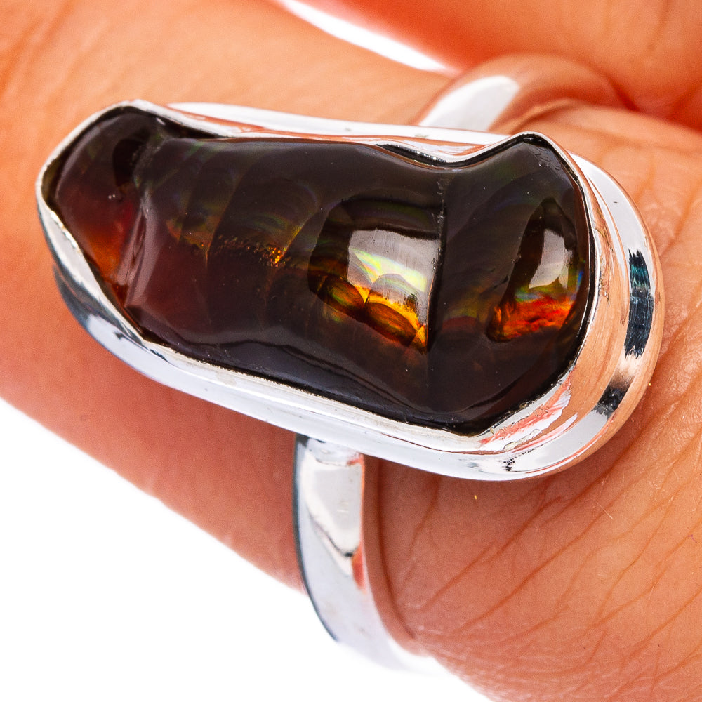 Sterling silver ring with dark fire agate cabochon, amber-red internal glow