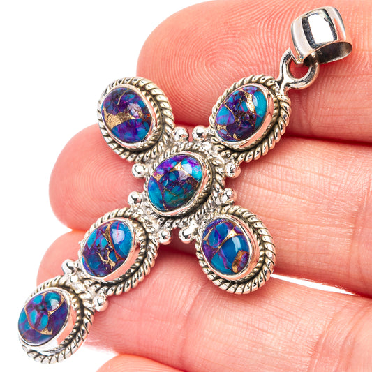Sterling silver cross pendant with oval purple-blue turquoise stones, top bail loop