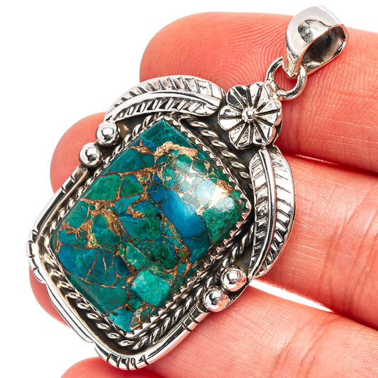 Chrysocolla oval pendant in .925 sterling silver with turquoise stone