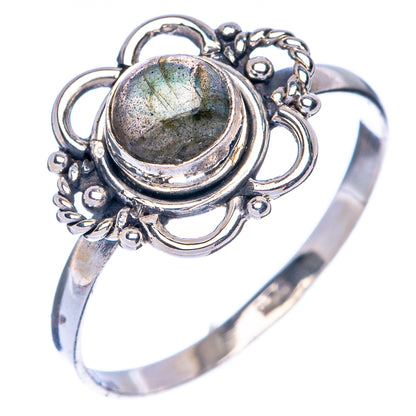 Dainty sterling silver ring with oval labradorite stone and twisted metal halo
