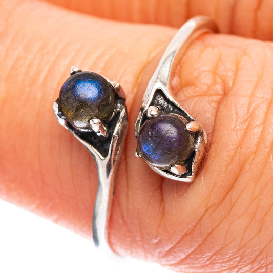 Sterling silver labradorite ring with oval blue sheen stone in prong bezel
