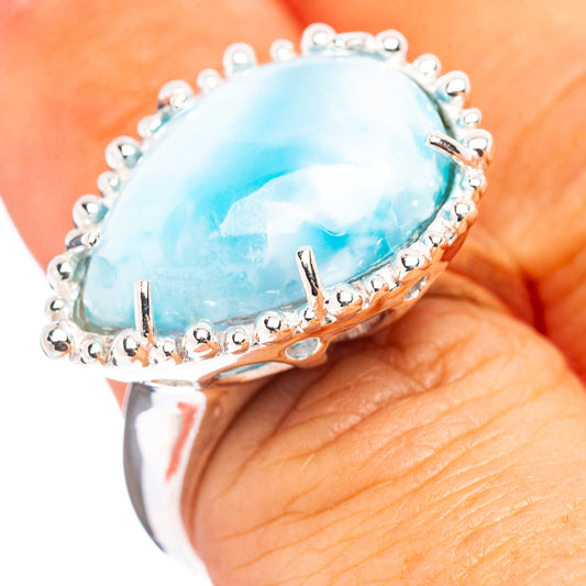 Sterling silver larimar ring with oval blue gemstone, beaded edge prongs
