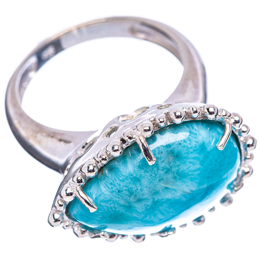 Oval blue larimar cabochon sterling silver ring with side prong details