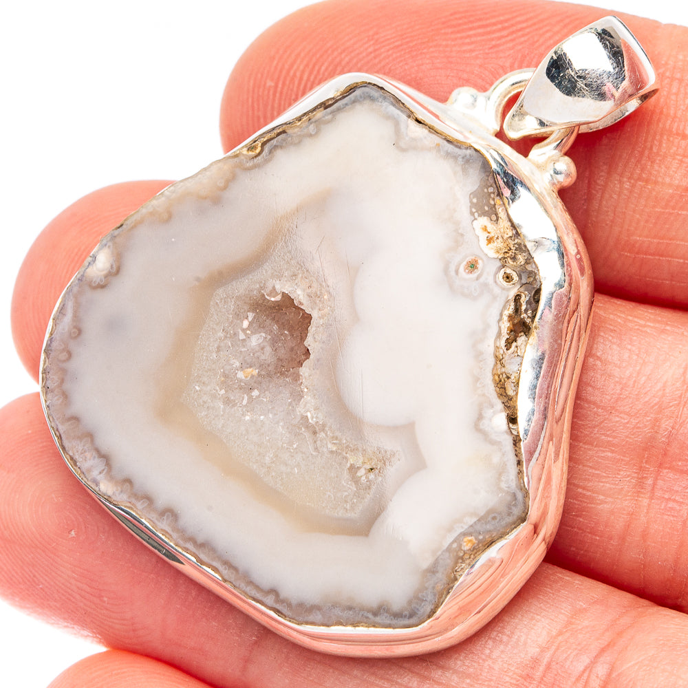 White geode slice sterling silver pendant with silver bezel and curved bail