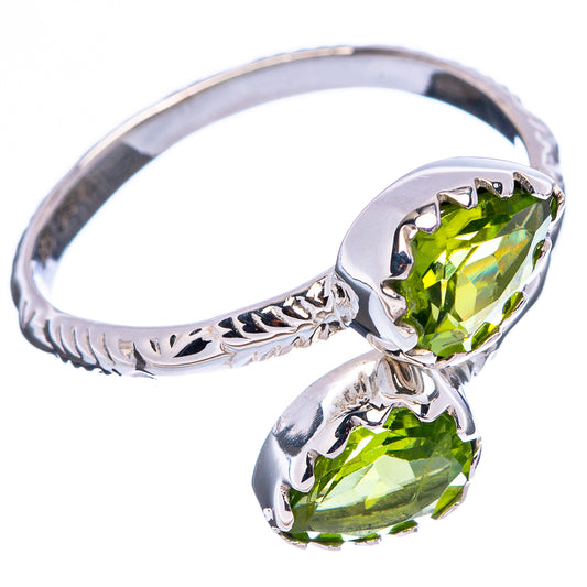 Sterling silver peridot ring, size 9.25, oval green stones with detailed side setting