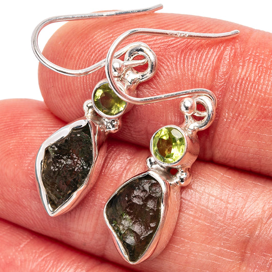 Sterling silver drop earrings with round green stones and dark teardrop moldavite