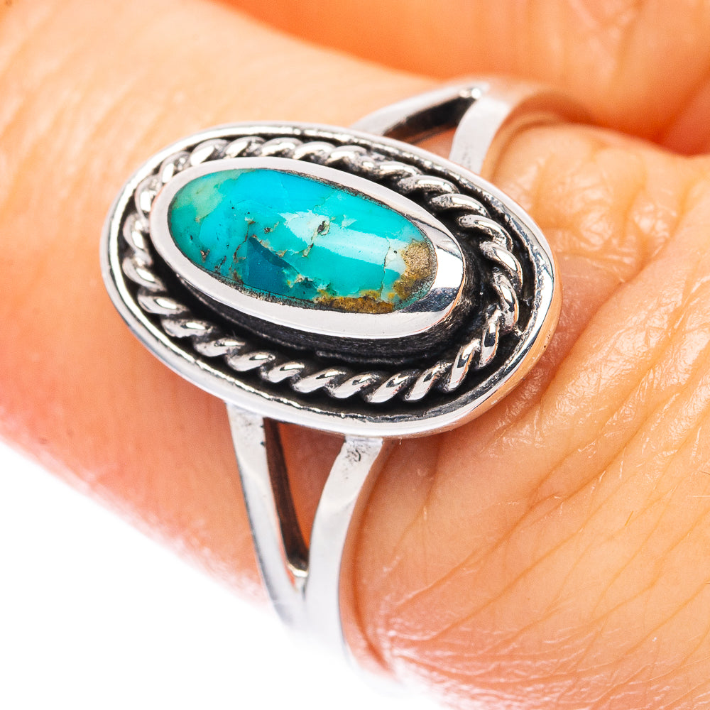 Oval turquoise cabochon silver ring with ornate rope bezel, size 6.75