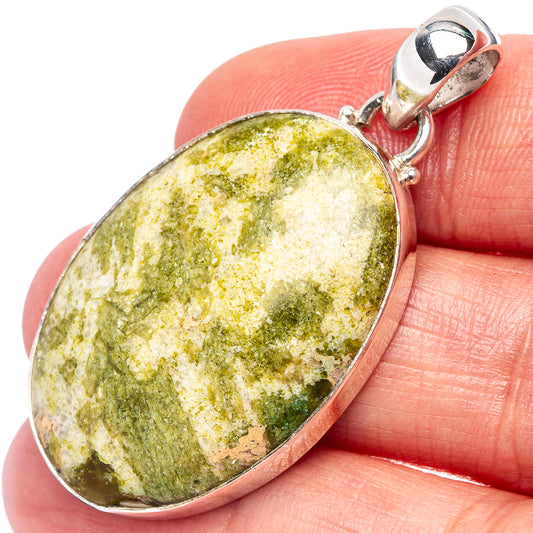 Lizardite pendant with green mottled oval stone and .925 sterling silver bezel
