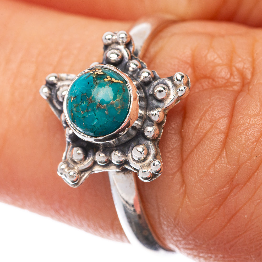 Turquoise cabochon dainty sterling silver ring with ornate floral halo setting