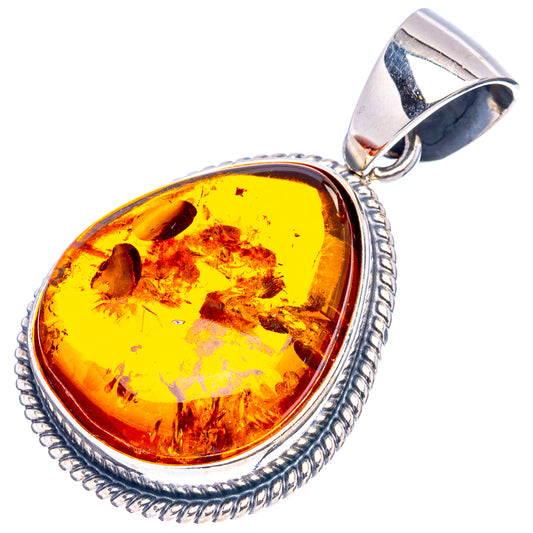 Oval amber pendant with 925 sterling silver bezel and loop bail
