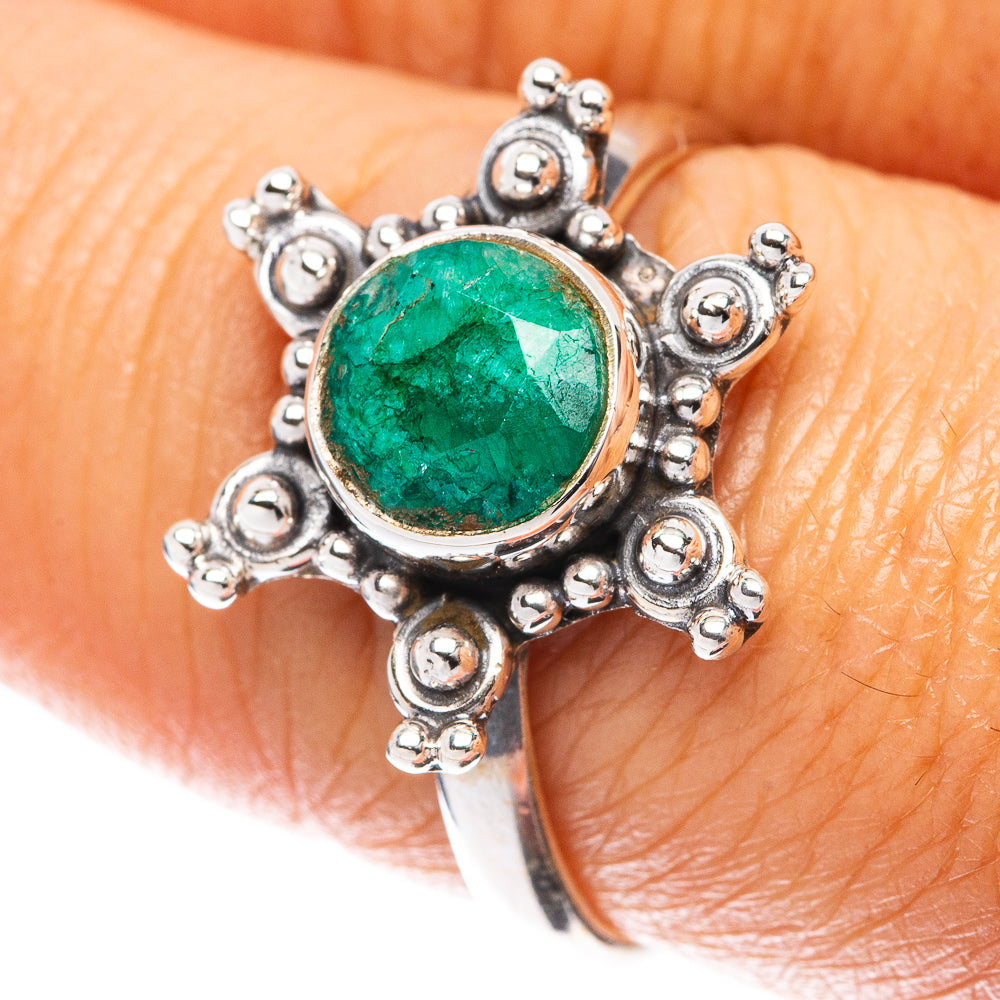 Green oval gemstone ring in ornate sterling silver setting, openwork floral crown