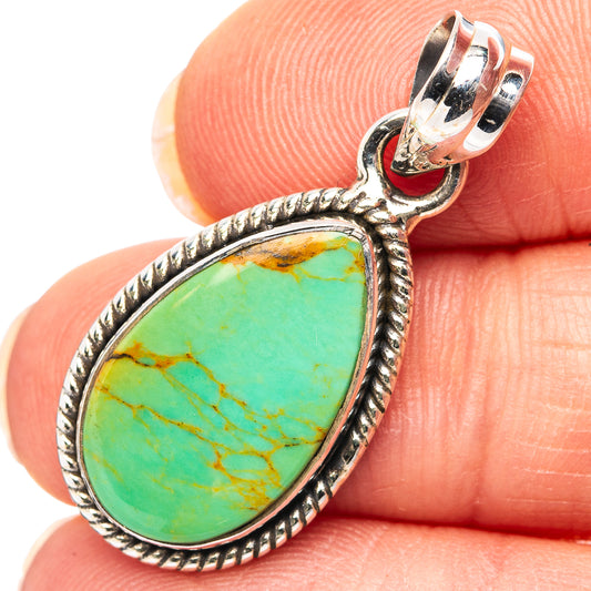 Sterling silver turquoise teardrop pendant detail with rope edge and bright stone face