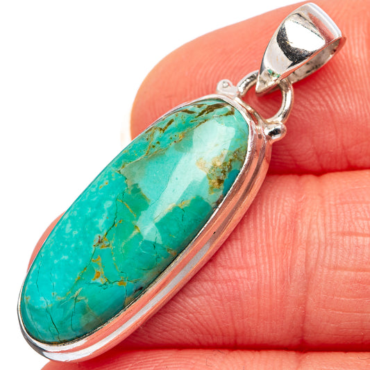 Oval turquoise pendant in .925 sterling silver bezel with bail loop